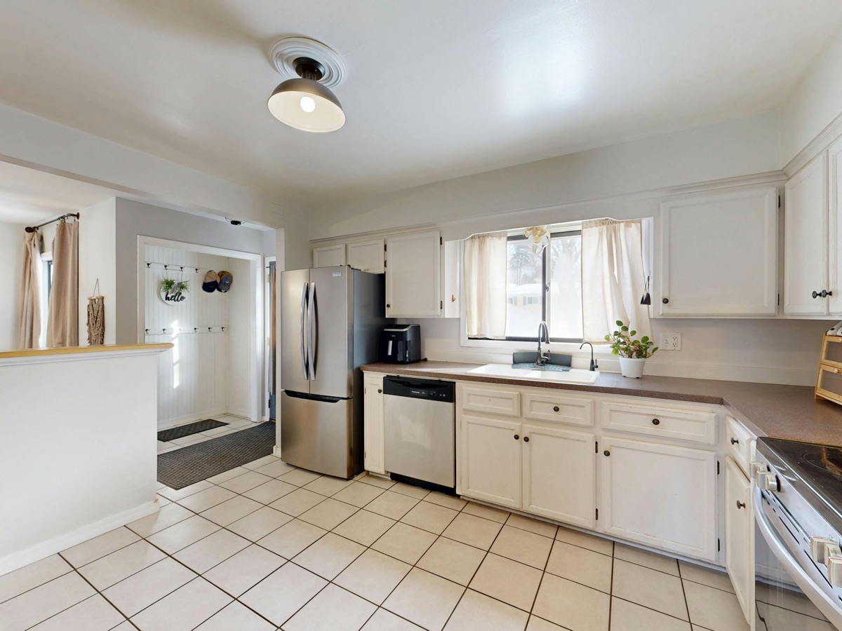 Bright, spotless kitchen after a full 23-point clean